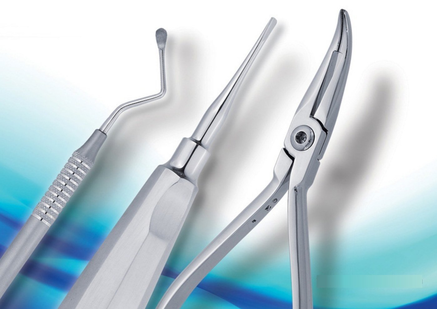 Dental hand instruments: a composite plugger, a root elevator and a crown remover